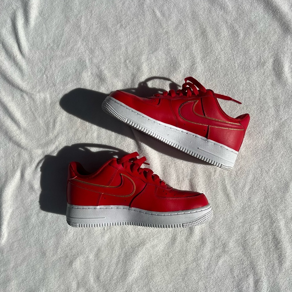 Red and gold Nike Air Force 1